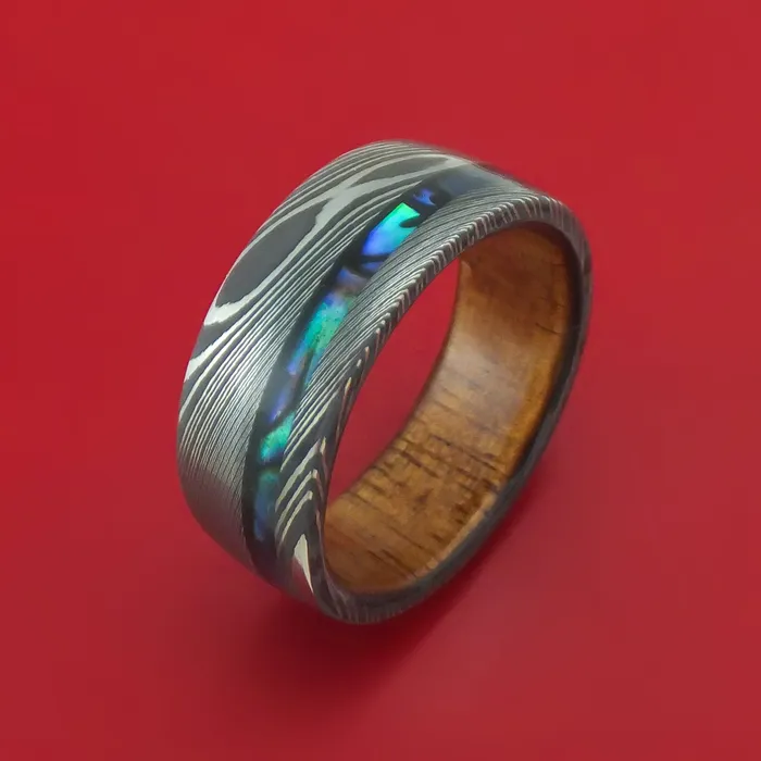 Rings Lashbrook Damascus Steel Ring with Abalone and Wood Sleeve Custom Made Rings Lashbrook Damascus Steel Ring with Abalone and Wood Sleeve Custom Made